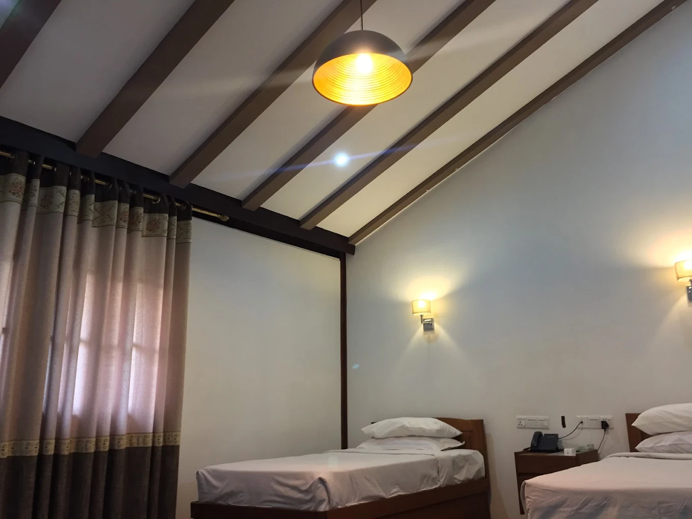 Teak-beamed guest room at the Meiktila Hotel