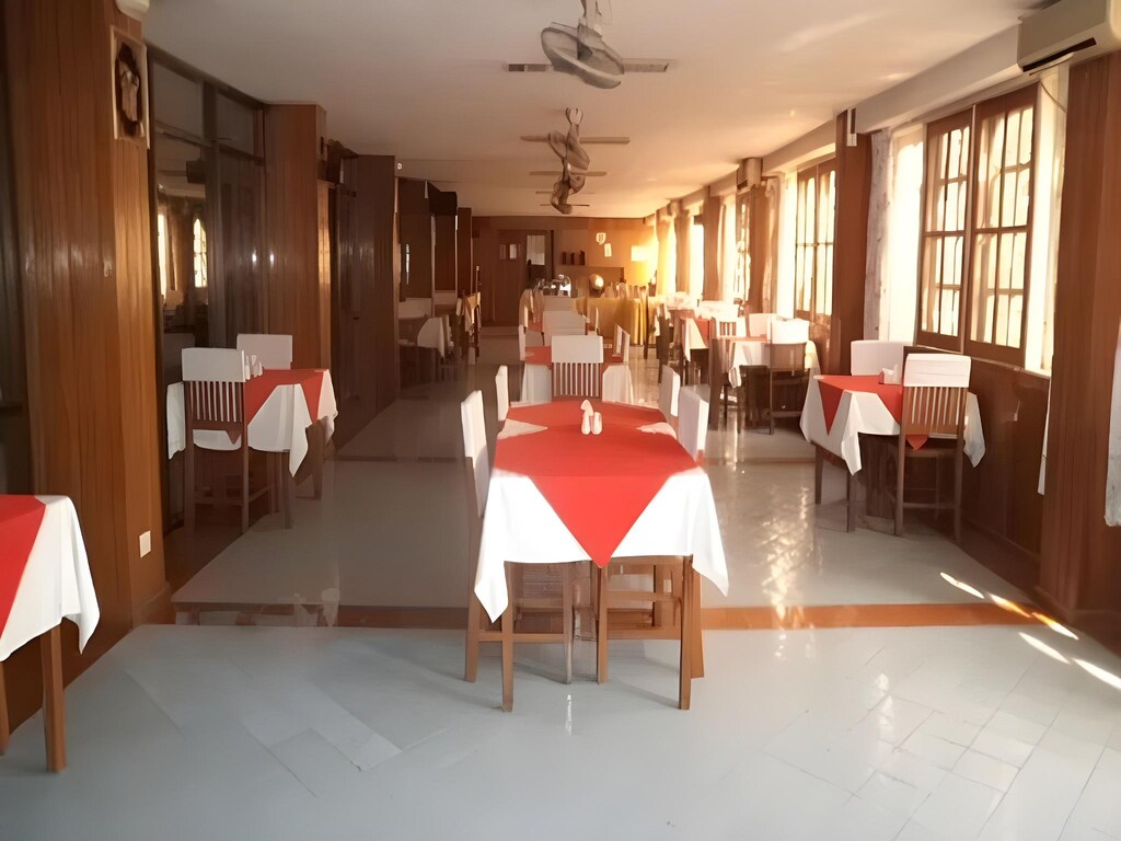 Teak-panelled restaurant at the Zegyo Lifestyle Hotel